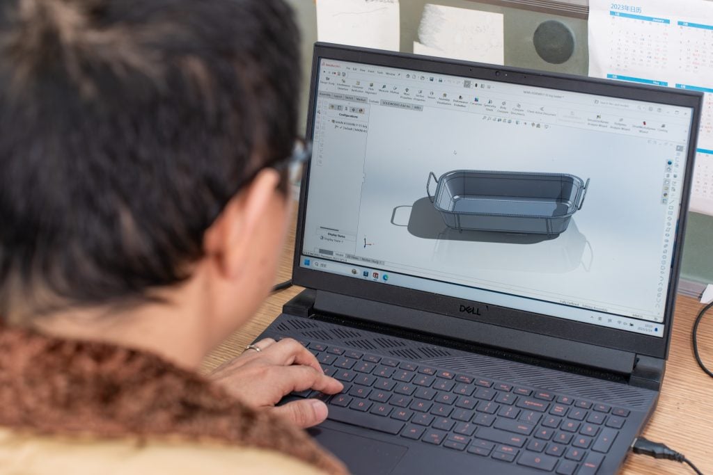 man creating a kitchenware design