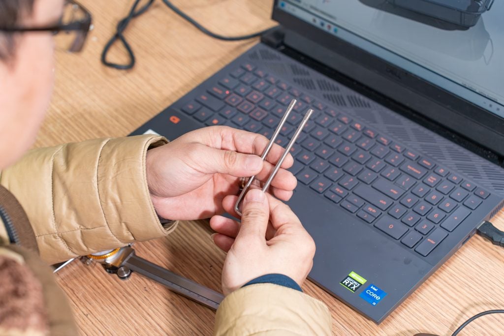 worker testing a product