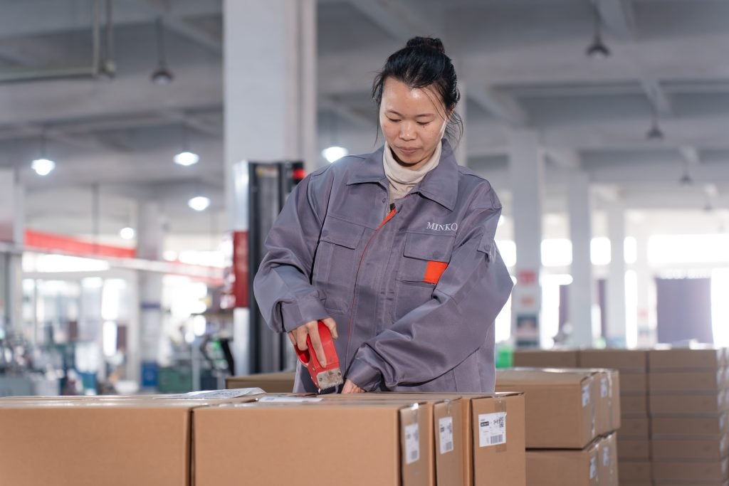 woman packing a box